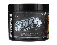 Jar of Suavecito Pomade with a black lid on a white background