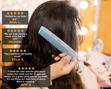 Load image into Gallery viewer, Person using a blue comb on hair with customer reviews displayed.
